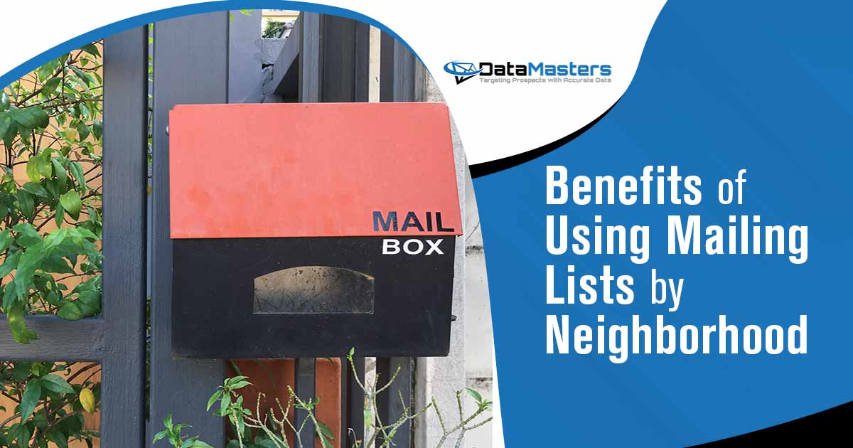 Red and black steel mailbox positioned before a steel fence, adorned with DataMasters branding. Emphasizing the benefits of utilizing neighborhood-specific mailing lists, harmonizing seamlessly with the page's context.