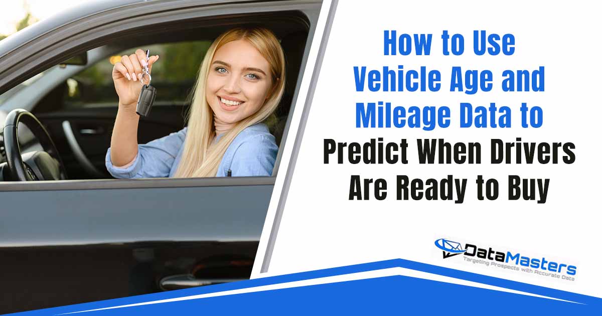 Image of a happy woman holding car keys while sitting in a vehicle during a driving lesson, featuring DataMasters and highlighting how vehicle age and mileage data can help predict when drivers are ready to buy.