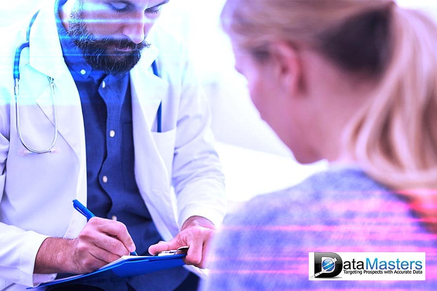 Blue back ground image with image on the right showing a doctor and female patient in consultation.