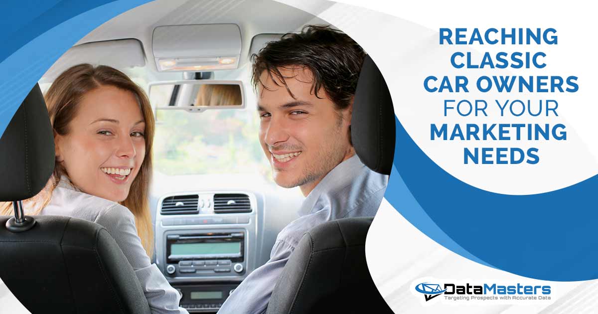 Reaching classic car owners Back view of a couple driving a car, featuring DataMasters branding, and highlighting the strategic approach of reaching classic car owners for your marketing needs, thoughtfully aligned with the page's context.