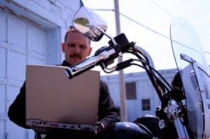 biker-checking-e-mail