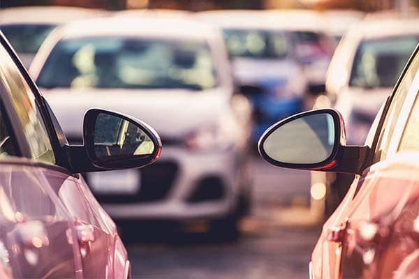 Vehicles in a parking lot signifying that may be considered "lemons" and fall into the DataMasters Lemon Law Mailing List Database