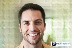 Image of a young hispanic male smiling and looking forward